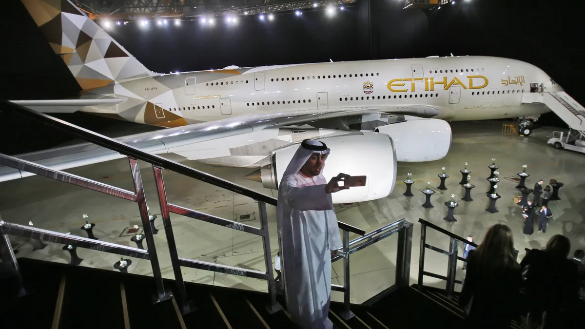 Abu Dhabi's Etihad Airways sees a $143 mn profit in 2023 as passenger numbers rise